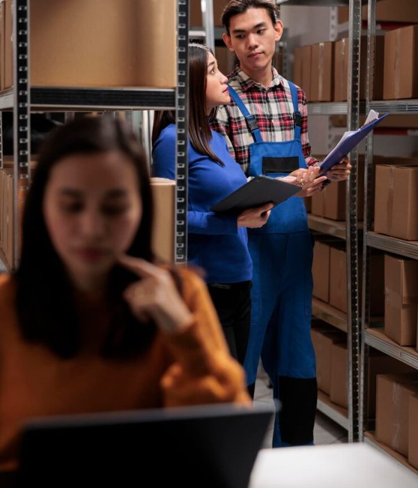 warehouse-asian-manager-distribution-operator-managing-stock-tracking-looking-cardboard-boxes-shelf-storehouse-employees-searching-goods-picking-customer-order_482257-71305